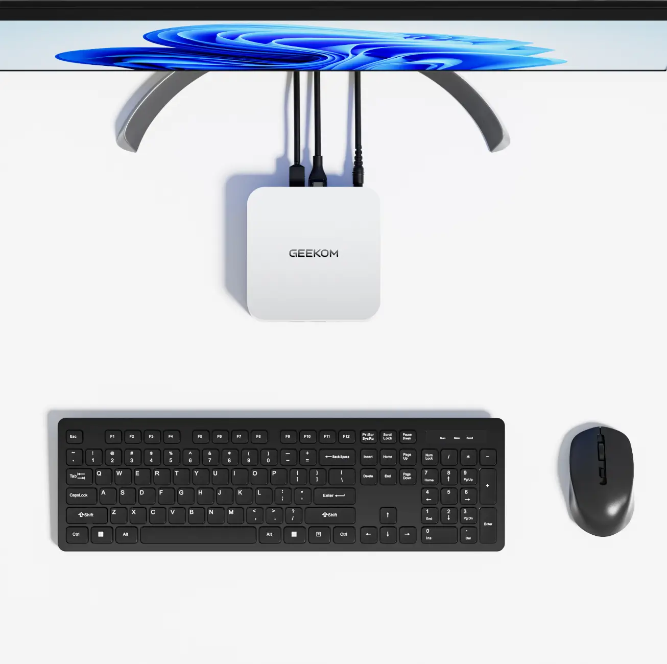 Mini PC compatto ed elegante posizionato sulla scrivania, salvaspazio